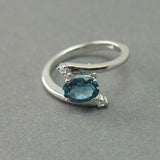 1.2ct Oval Cut London Blue Topaz Swirl Solitaire Trilogy Ring 14k WhiteGold Over