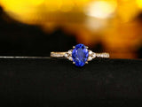 2.3ct Oval Cut Blue Tanzanite Petite Round Accents Ring 14k Yellow Gold Finish