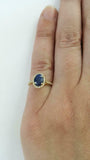 2ct Oval Cut Blue Sapphire Halo Solitaire with Accent Ring 14k YellowGold Finish