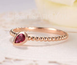 0.5ct Pear Cut Simulated Ruby Beaded Ball Solitaire Ring 14k Rose Gold Plated