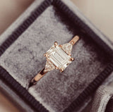 0.5ct Emerald Cut Simulated Diamond Trilogy Engagement Ring 14k Rose Gold Plated