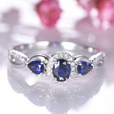 2.2ct Oval Cut Blue Sapphire Engagement Ring Halo Trilogy 14k White Gold Finish