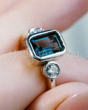2.2ct Emerald Cut Simulated London Blue Topaz Trilogy Ring 14k White Gold Plated