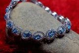 18ct Oval Cut Blue Topaz Diamond Halo Women Tennis Bracelet 14k White Gold Over