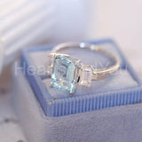 2.3ct Emerald Cut Simulated Blue Aquamarine Trilogy Ring 14k White Gold Plated