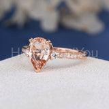 1.2ct Pear Cut Simulated Morganite Accented Trilogy Ring 14k Rose Gold Plated